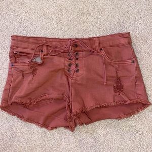 Pink lace up jean shorts from billabong